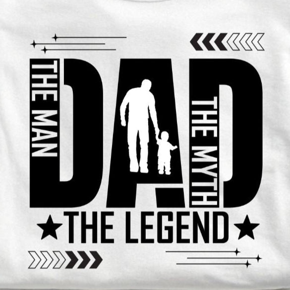 White t-shirt with 'The Man, The Myth, The Legend' design on a wooden surface