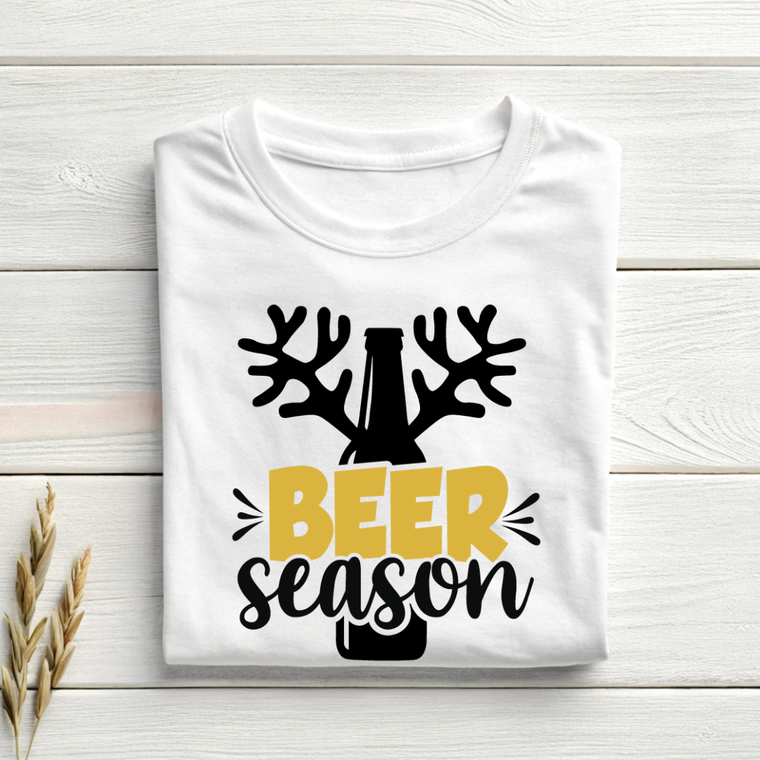 White t-shirt with 'Beer Season' design on a wooden surface