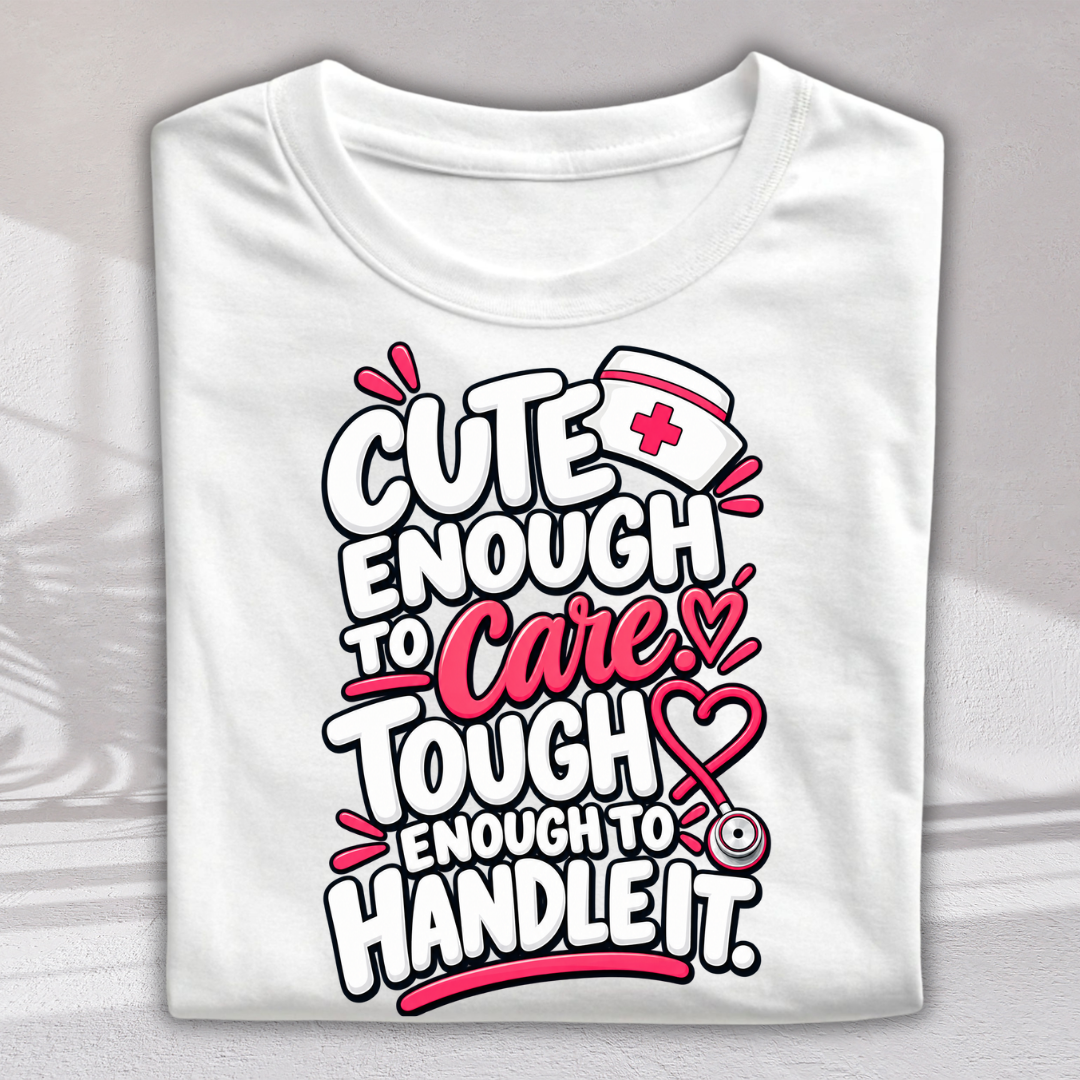 A folded white short-sleeve t-shirt with a colorful graphic print on the front. The graphic features the text 'CUTE ENOUGH TO Care.