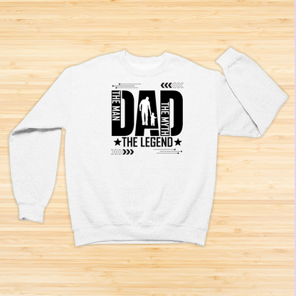 White sweatshirt with black text design on a wooden surface