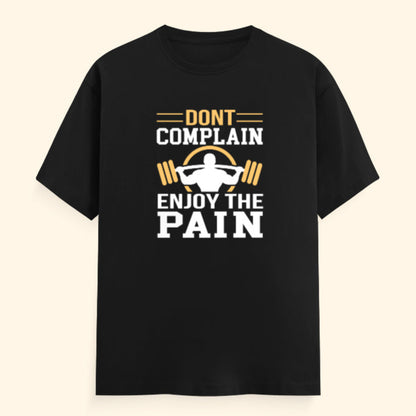 Black t-shirt with motivational graphic and text on a beige background