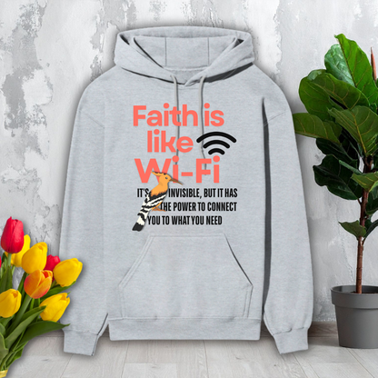 Gray hoodie with motivational quote on a light gray background with flowers and a plant.