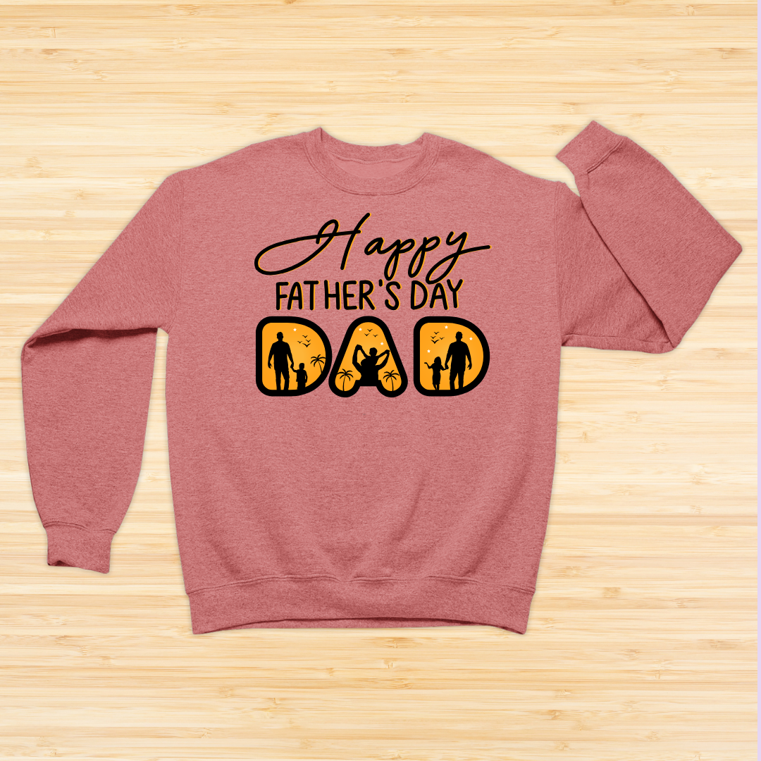 Coral sweatshirt with 'Happy Father's Day DAD' text and graphics on a wooden surface