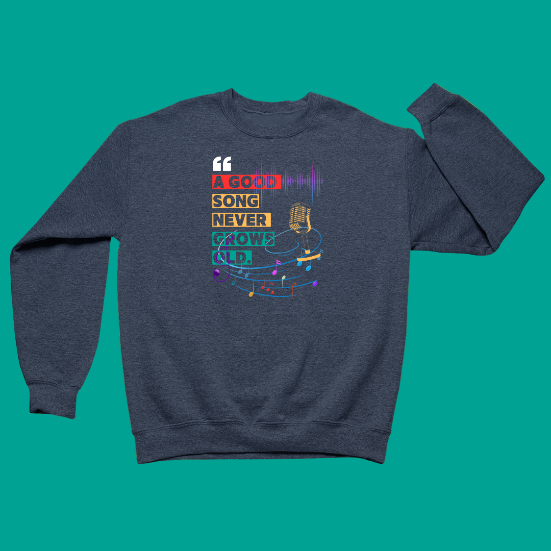 Navy blue sweatshirt with colorful graphic design on a green background