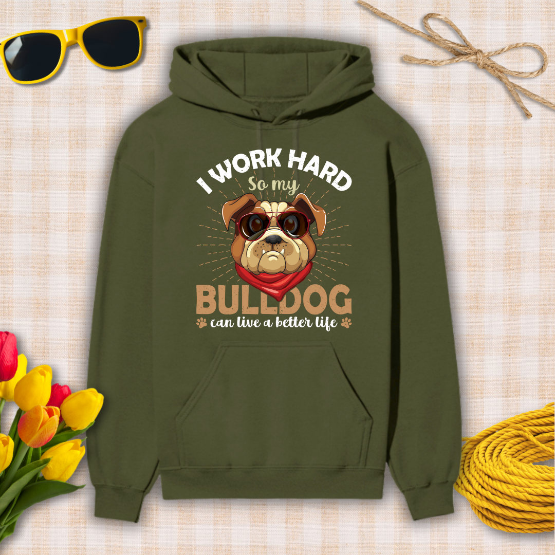 Green hoodie with bulldog graphic and text on a checkered background with sunglasses, flowers, and twine.