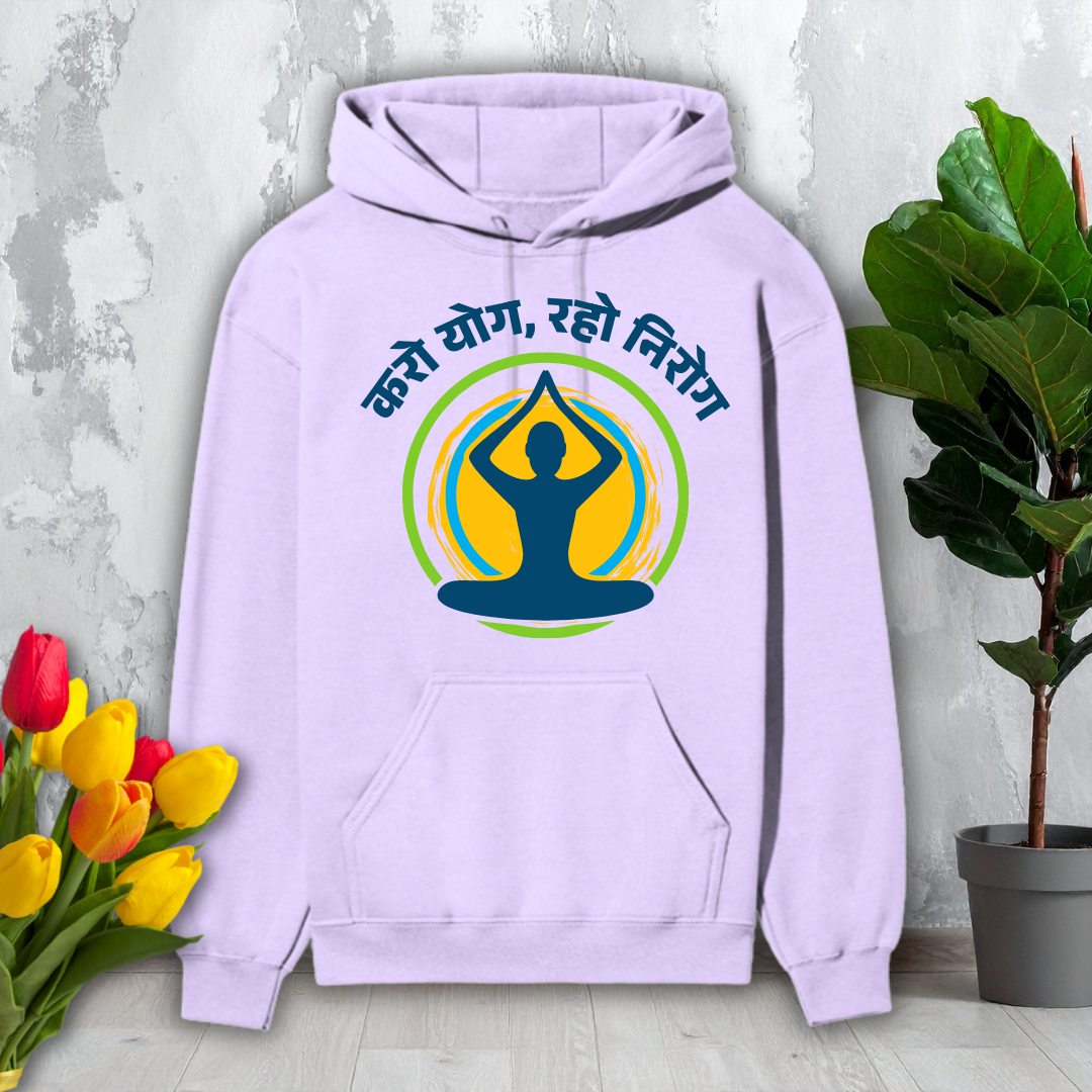 Light purple hoodie with yoga design and text on a light gray background with flowers and a plant.