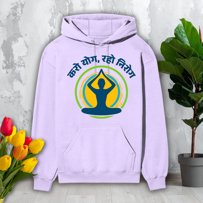 Light purple hoodie with yoga design and text on a light gray background with flowers and a plant.