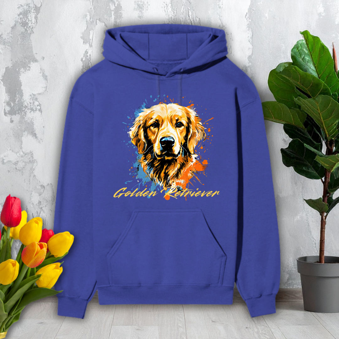 Blue hoodie with a Golden Retriever design on a white surface with flowers and a plant.