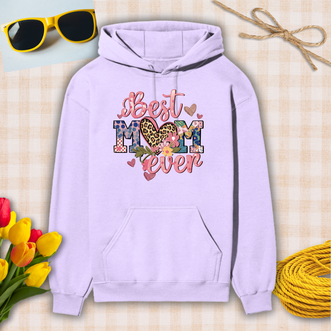 Lavender hoodie with 'Best Mom Ever' text on a checkered background with sunglasses, flowers, and twine.