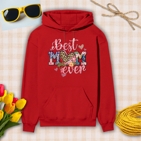 Red hoodie with 'Best Mom Ever' text on a checkered background with sunglasses, flowers, and twine.