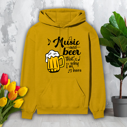 Yellow hoodie with a graphic and text 'Music and beer that's why I'm here' on a light gray background.
