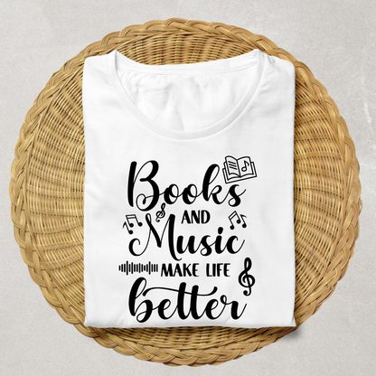 A folded white t-shirt with black text reading 'Books and Music MAKE LIFE better' decorated with musical notes and an open book graphic, displayed on a round woven wicker placemat over a light gray surface.