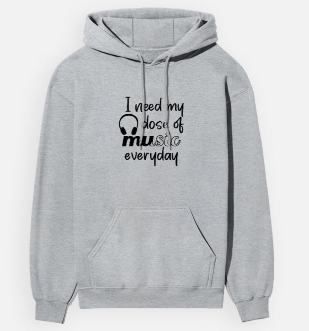 Gray hoodie with text 'I need my dose of music every day' on a white background