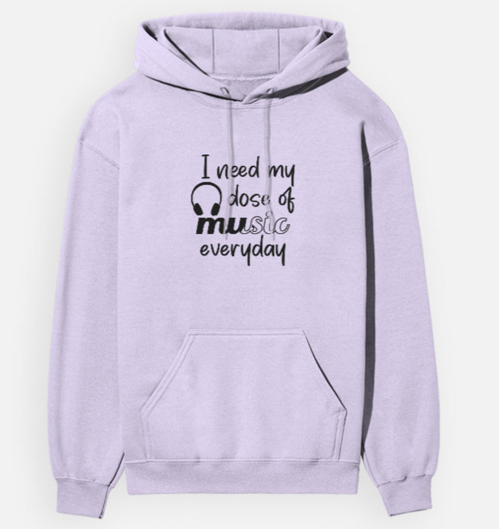 Lavender hoodie with text 'I need my dose of music everyday' on a white background