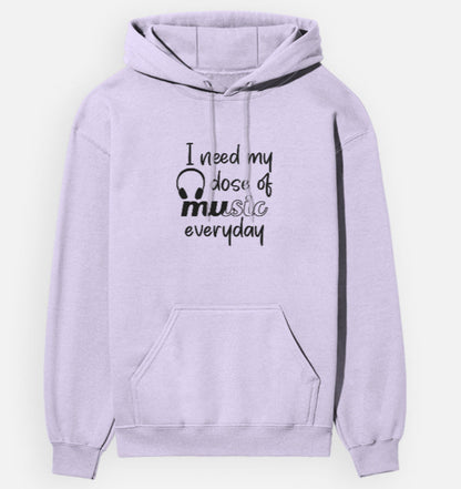 Lavender hoodie with text 'I need my dose of music everyday' on a white background