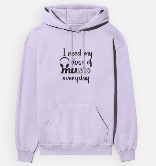 Lavender hoodie with text 'I need my dose of music everyday' on a white background