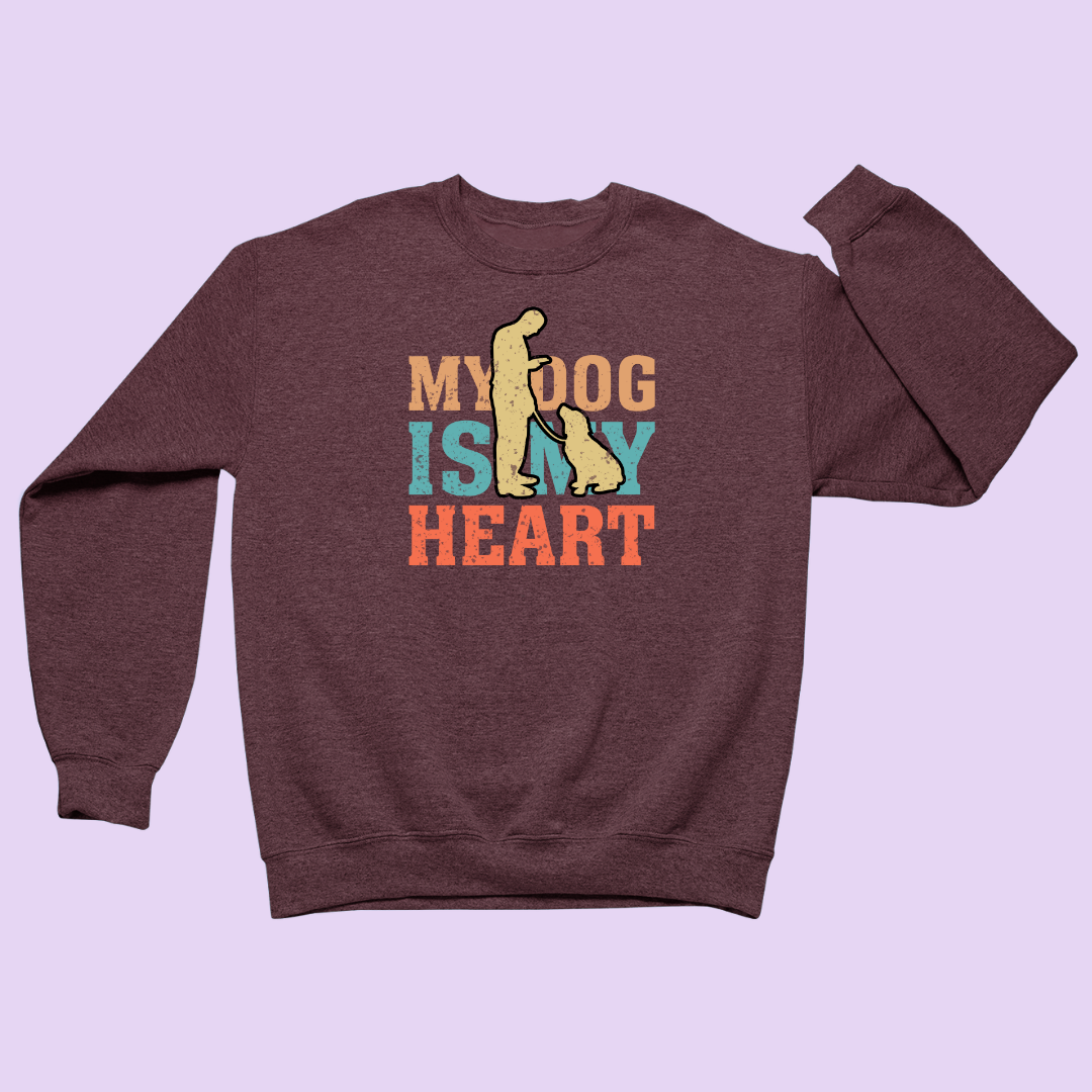 Maroon sweatshirt with 'My Dog is My Heart' text and graphics on a light purple background