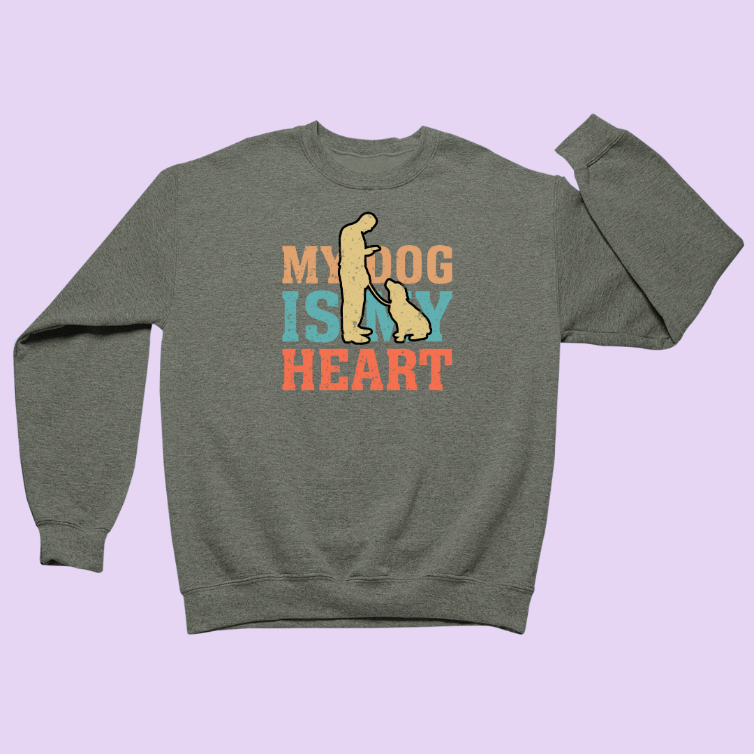 Green sweatshirt with 'My Dog is My Heart' text and graphics on a light purple background