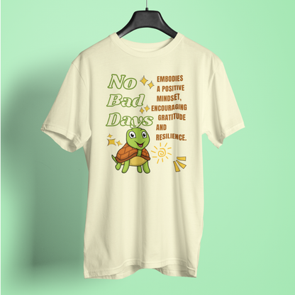T-shirt with a turtle graphic and motivational text on a green background