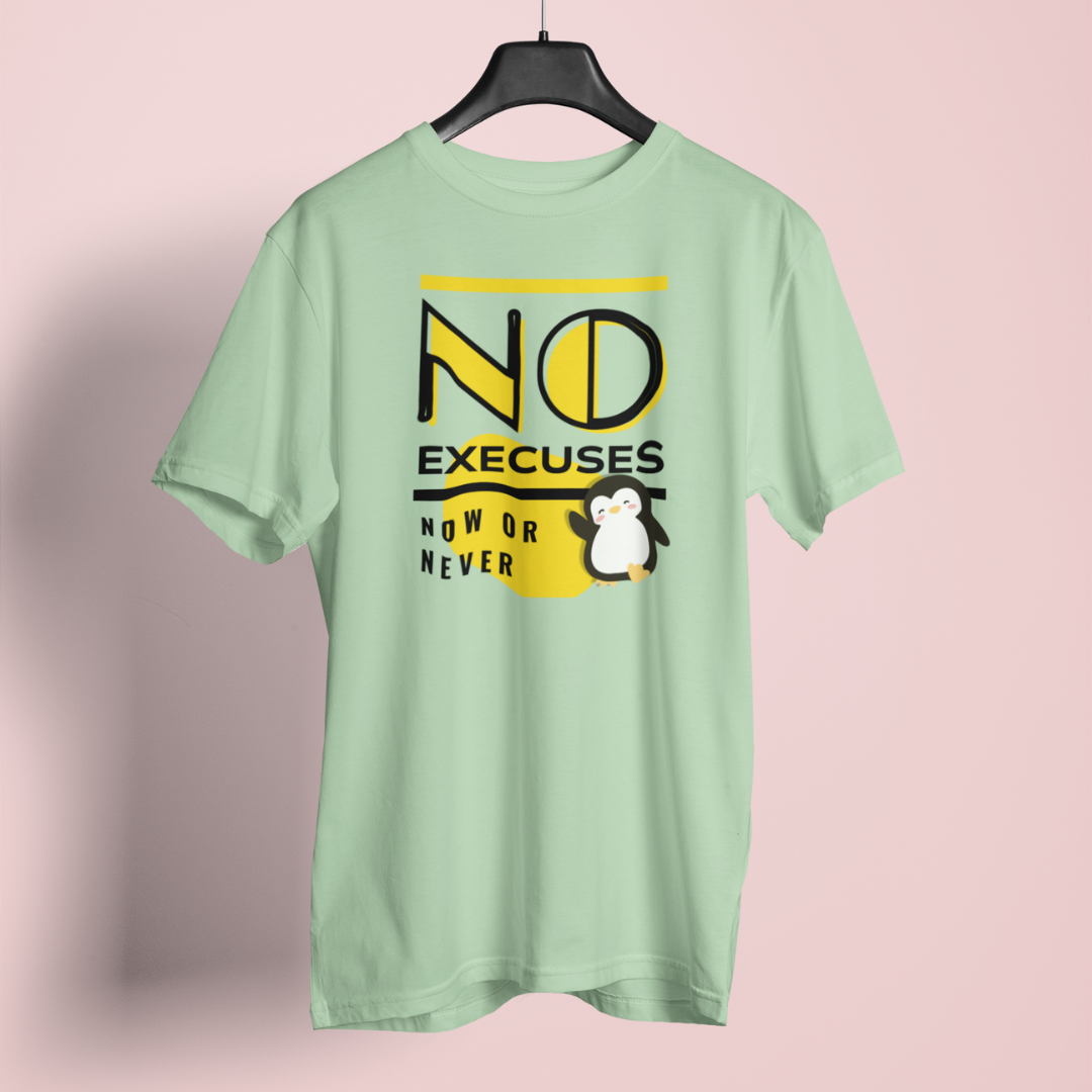 Light green t-shirt with motivational text and penguin graphic on a pink background