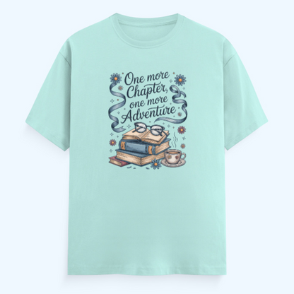 Mint green t-shirt with book-themed design and text on a light blue background