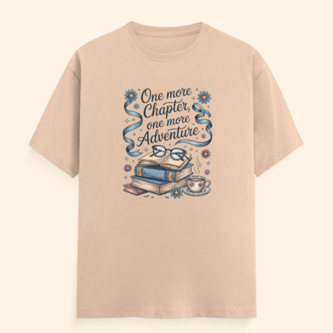 Beige t-shirt with book-themed graphic and text on a beige background