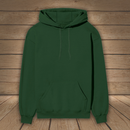 Green hoodie on a wooden background