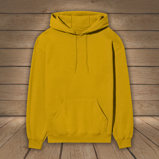 Yellow hoodie on a wooden background