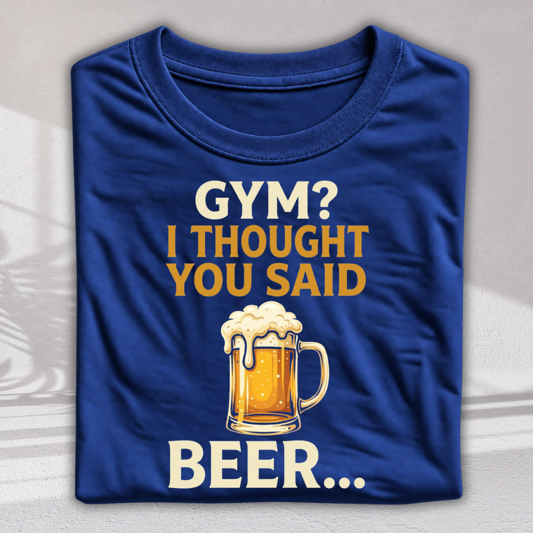 A folded royal blue t-shirt with a graphic print that reads 'GYM? I THOUGHT YOU SAID BEER.