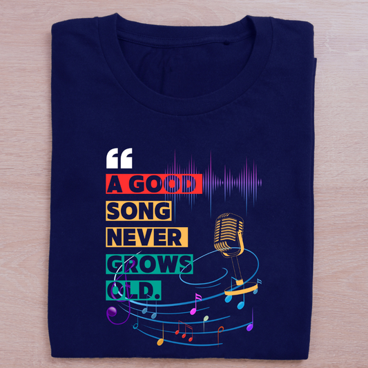 Nave Blue t-shirt with colorful text and graphic design on a wooden surface