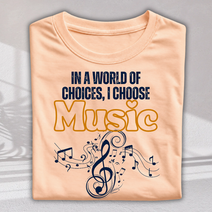 A peach-colored t-shirt with a graphic print that reads 'IN A WORLD OF CHOICES, I CHOOSE Music' in navy blue and yellow, featuring musical notes and a treble clef, shown on a light gray background.