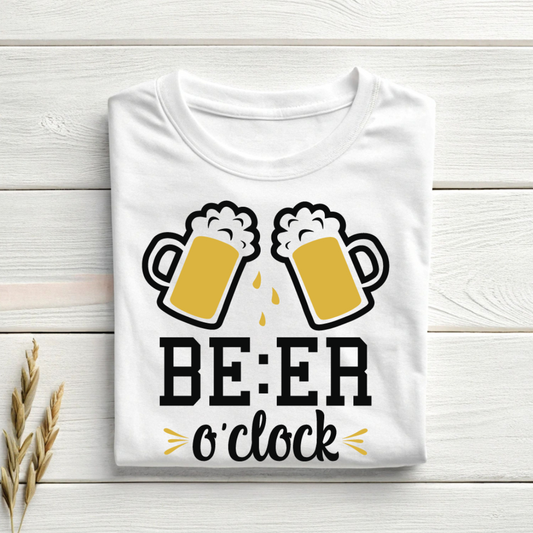 White t-shirt with beer-themed design on a wooden surface
