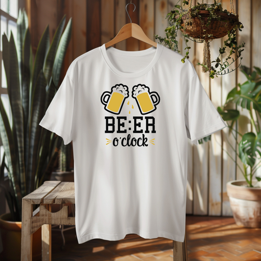 White t-shirt with 'BEER o'clock' design on a hanger in a room with plants.