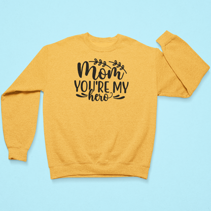 Yellow sweatshirt with 'Mom, you're my hero' text on a blue background