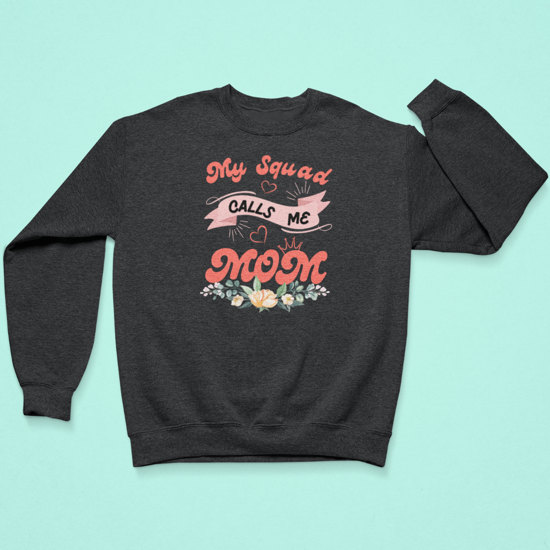 Dark gray sweatshirt with pink text and floral design on a light blue background