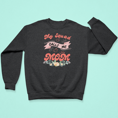Dark gray sweatshirt with pink text and floral design on a light blue background