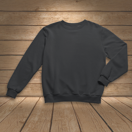 Black sweatshirt on a wooden surface