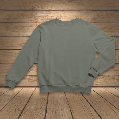 Green sweatshirt on a wooden surface