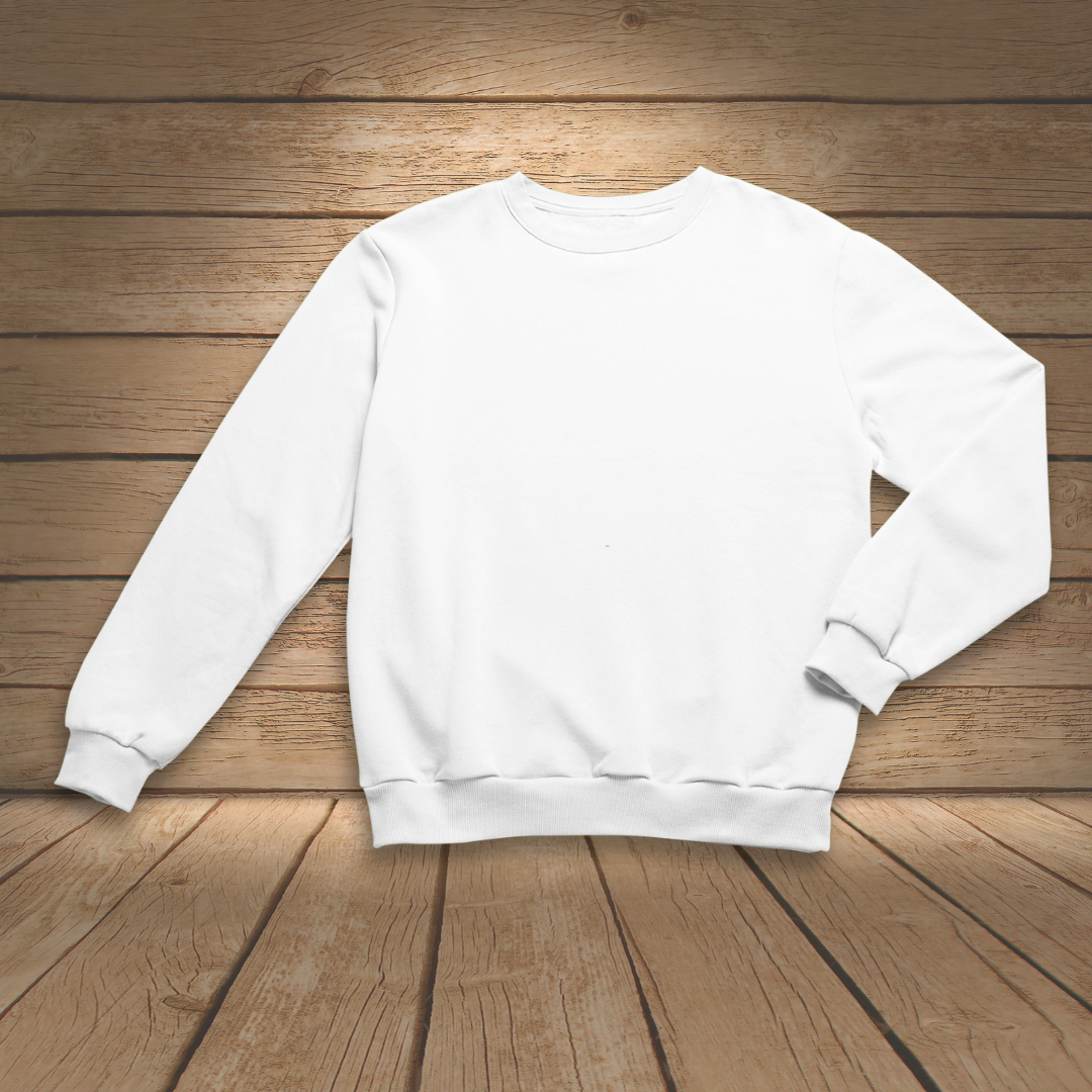 White sweatshirt on a wooden floor